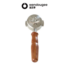 Bottom view of the wendougee dual spout espresso portafilter highlighting the symmetrical split spout design.