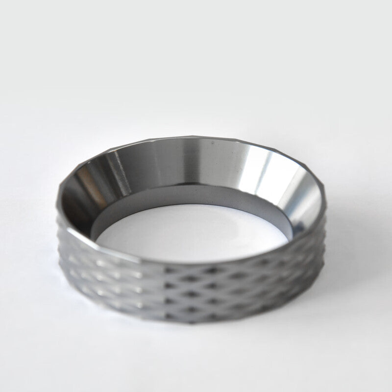 A close-up top-angle view of WENDOUGEE 58mm precision espresso dosing ring showcasing its wide-mouth funnel slope and diamond cut non-slip outer grip.